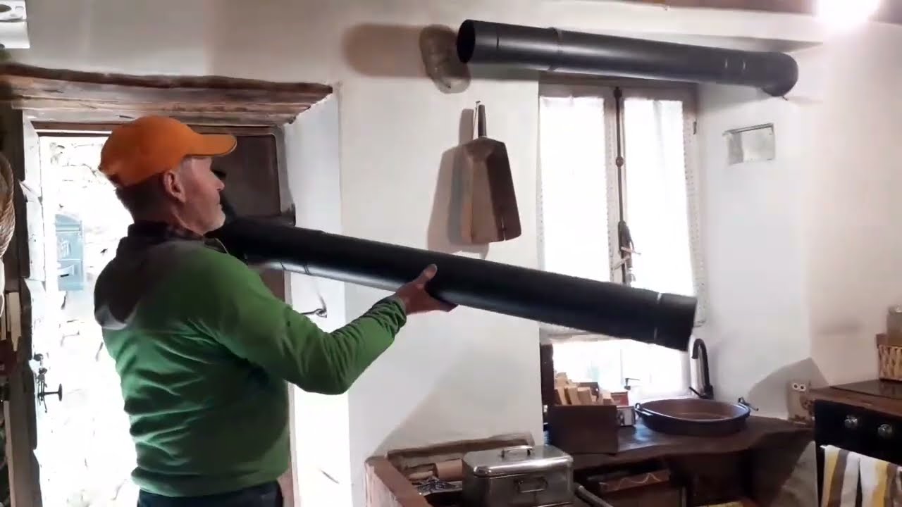 pulizia dei tubi e della canna fumaria della cucina economica a legna
