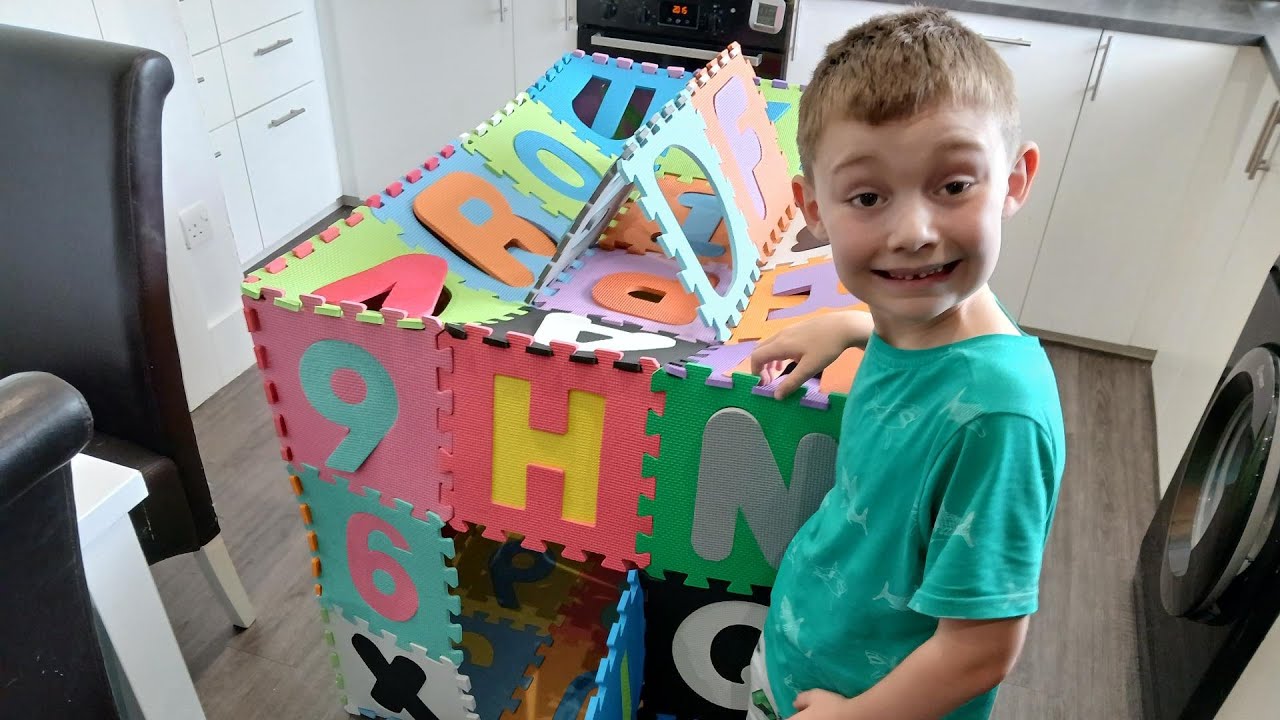 ALPHABET PLAY MATS | LOGAN BUILDS A BIG HOUSE USING PLAY MATS!