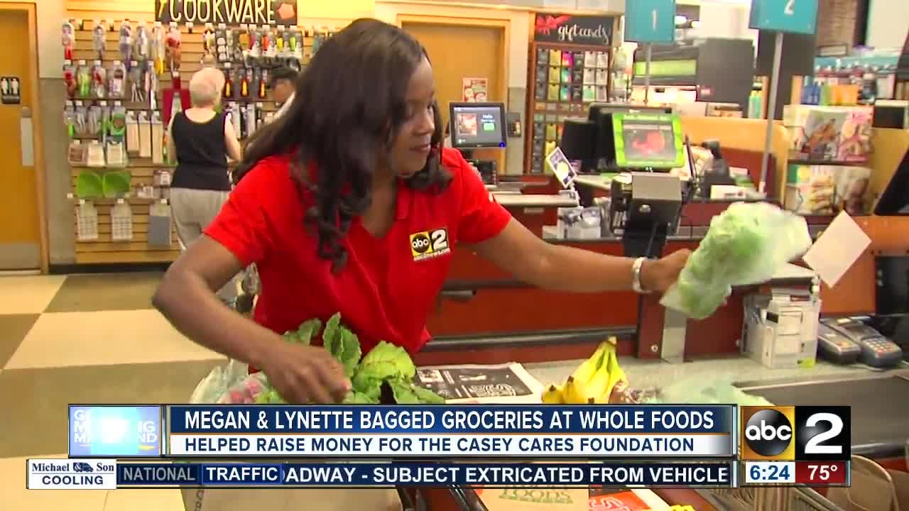 Megan Knight, Lynette Charles bagged groceries at Whole Foods for Casey Cares Foundation