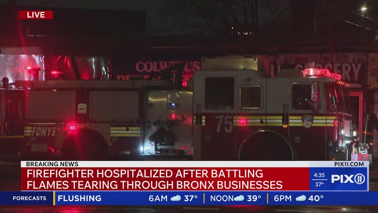 Early morning fire burns through NYC stores