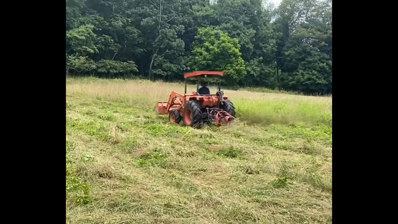 43 year Old Kubota L3750 Sweeping Hay, Butt Clinching STEEP!