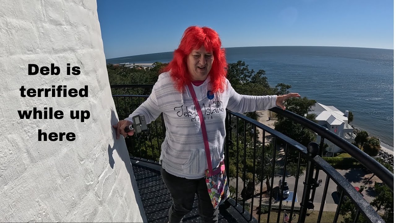 Terrified wife climbs 104 feet high, and 129 steps at St. Simons Island, Georgia.