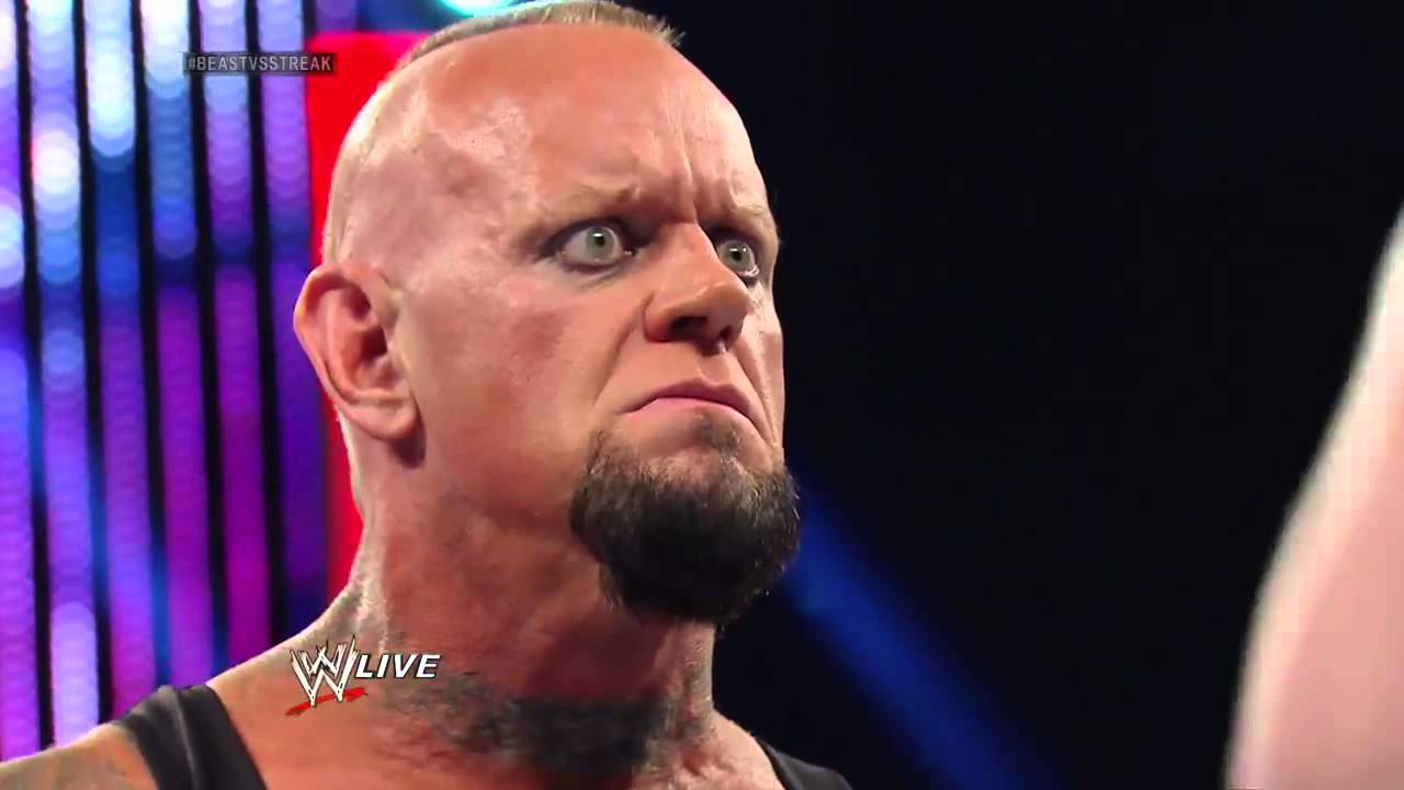 Undertaker rises from a coffin to attack Brock Lesnar  Raw, March 24, 2014