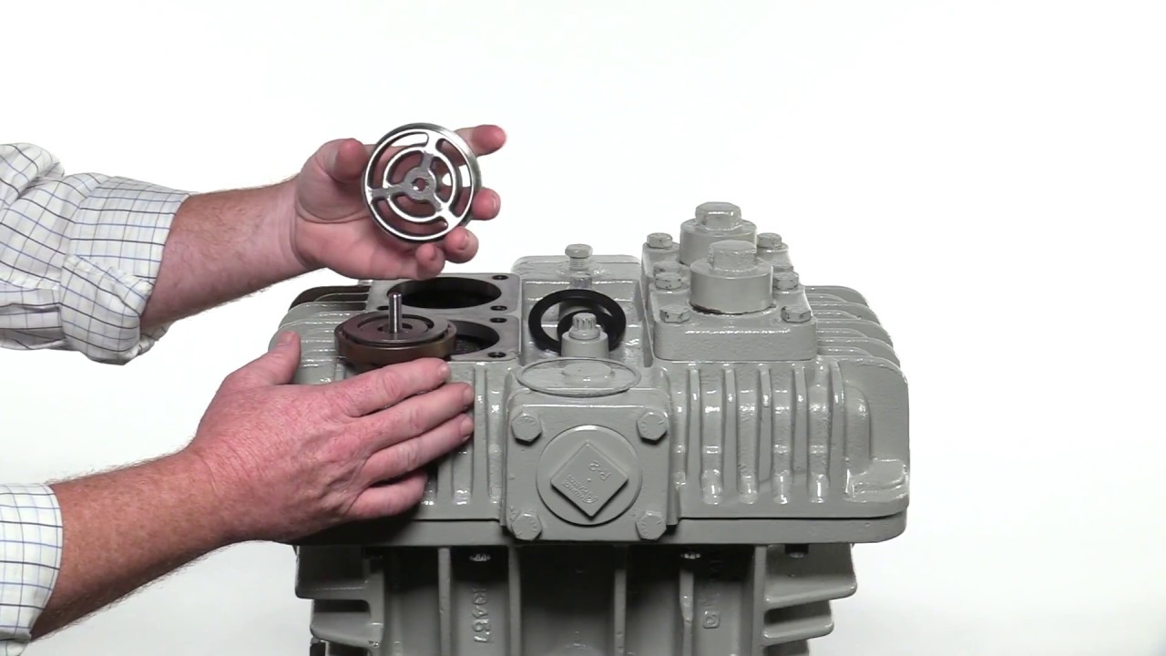 How to maintain the suction and discharge valves in a reciprocating vertical compressor
