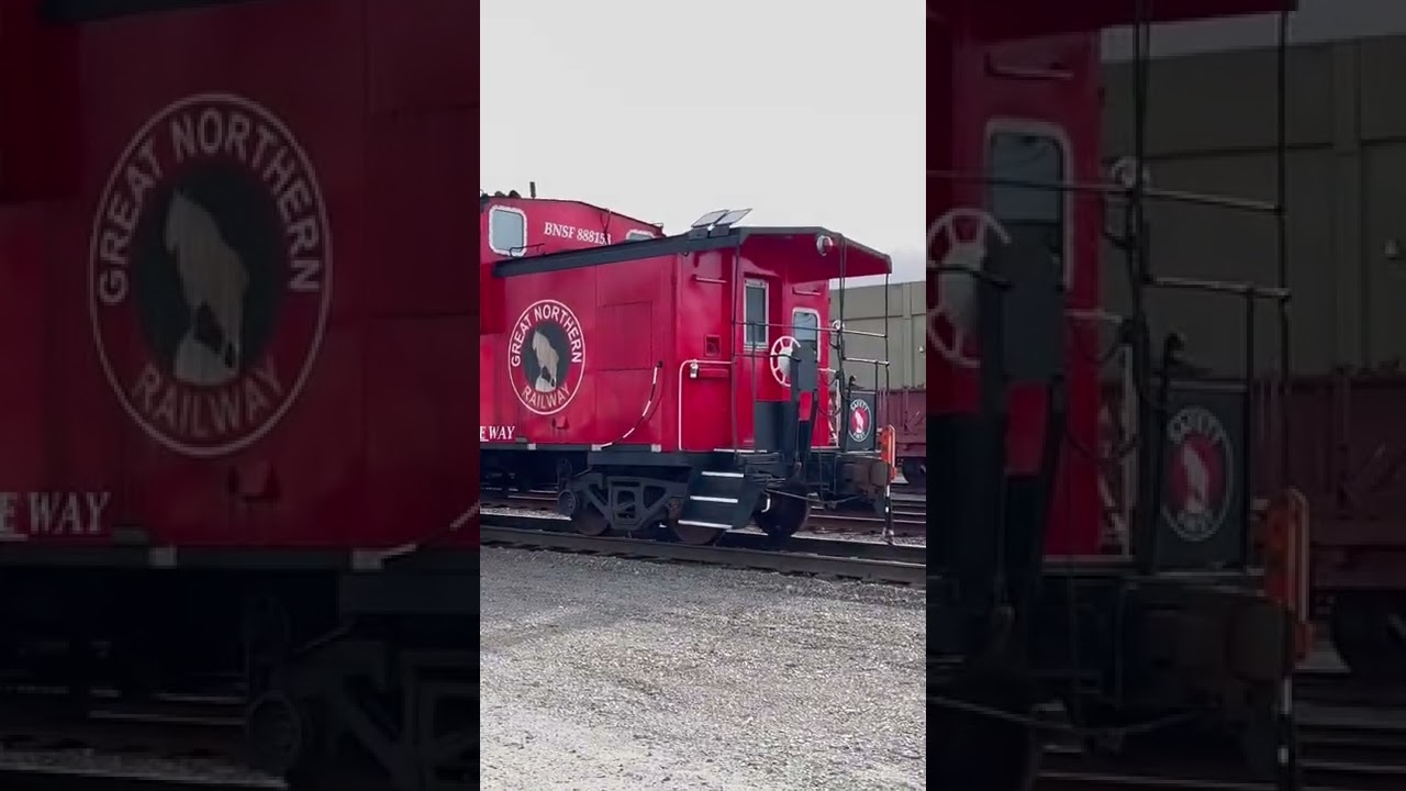 A Big Red Caboose in Great Northern Railway Colors and BNSF Railway EMD GP25 