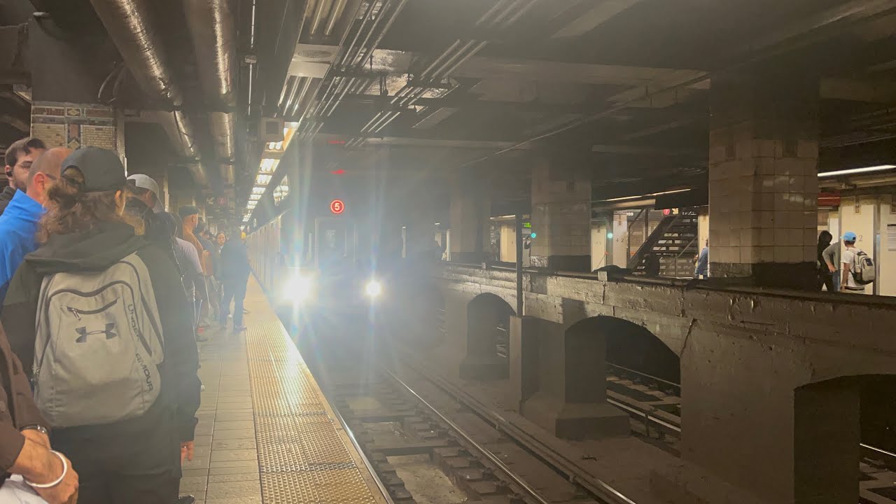 An R62 3 train, an R62A S train, and an R142A 5 train