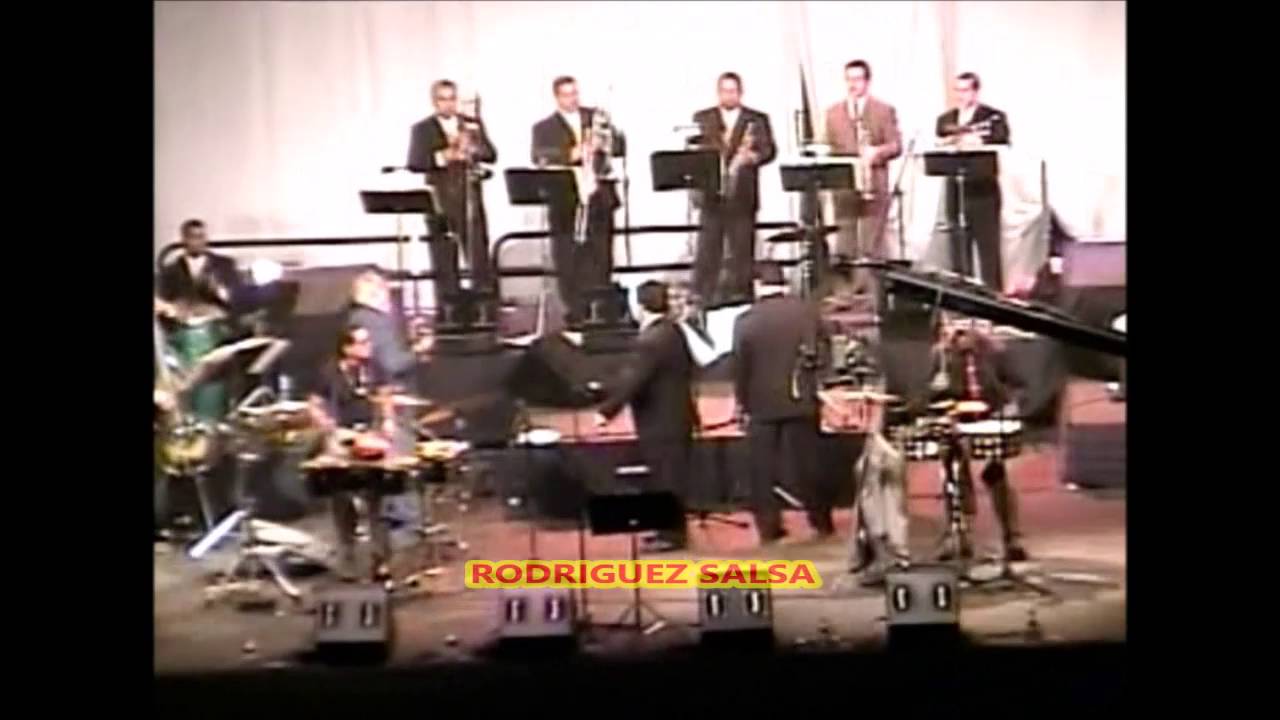 TOMMY OLIVENCIA .  BATALLA DE TIMBALES ..(CUERO NA MA)