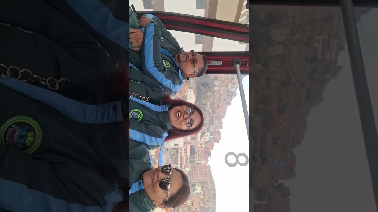 Subiendo en el teleférico hacia la virgen del socavon en oruro y la morenada comibol bloque iquique 