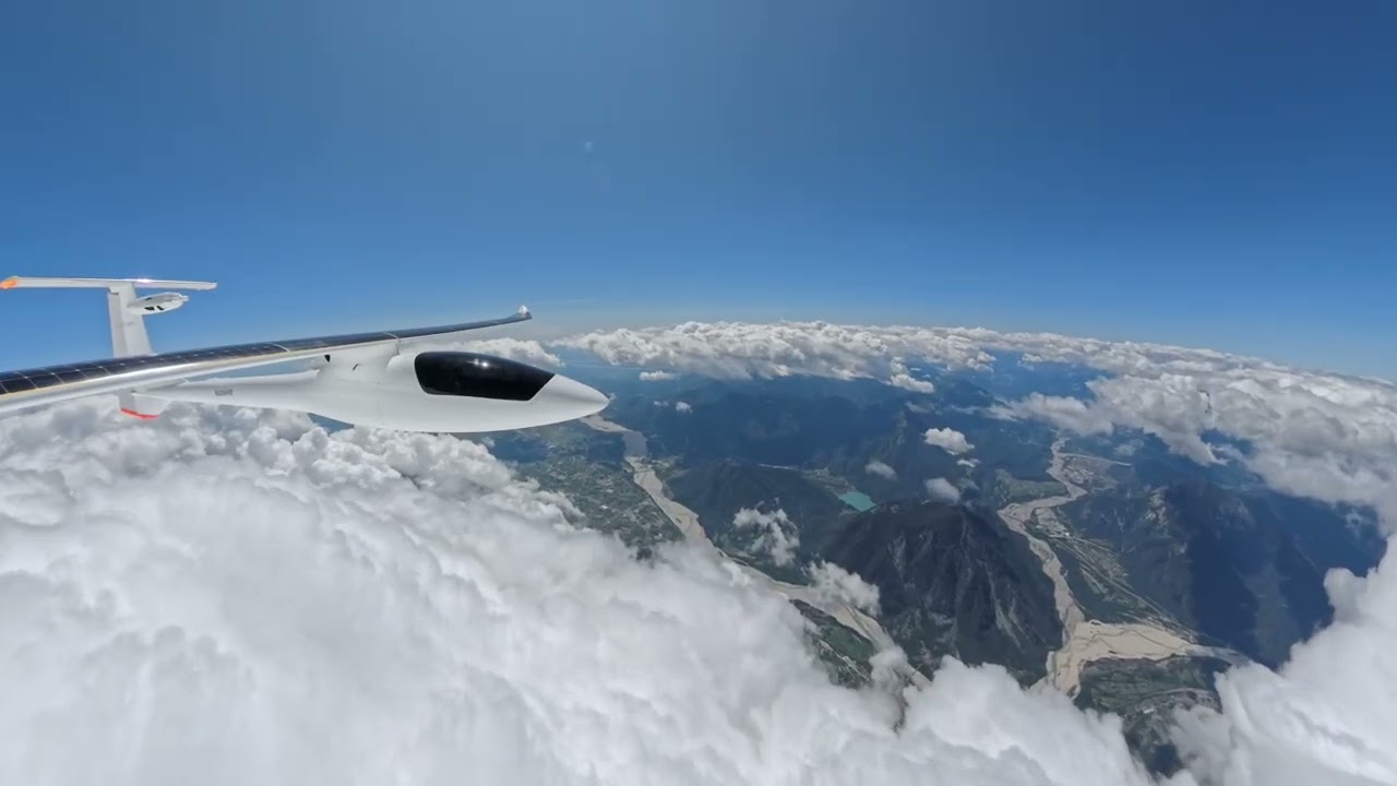 Flying the SUNSEEKER DUO in wave lift over the clouds. Lago di Cavazzo, Italy.