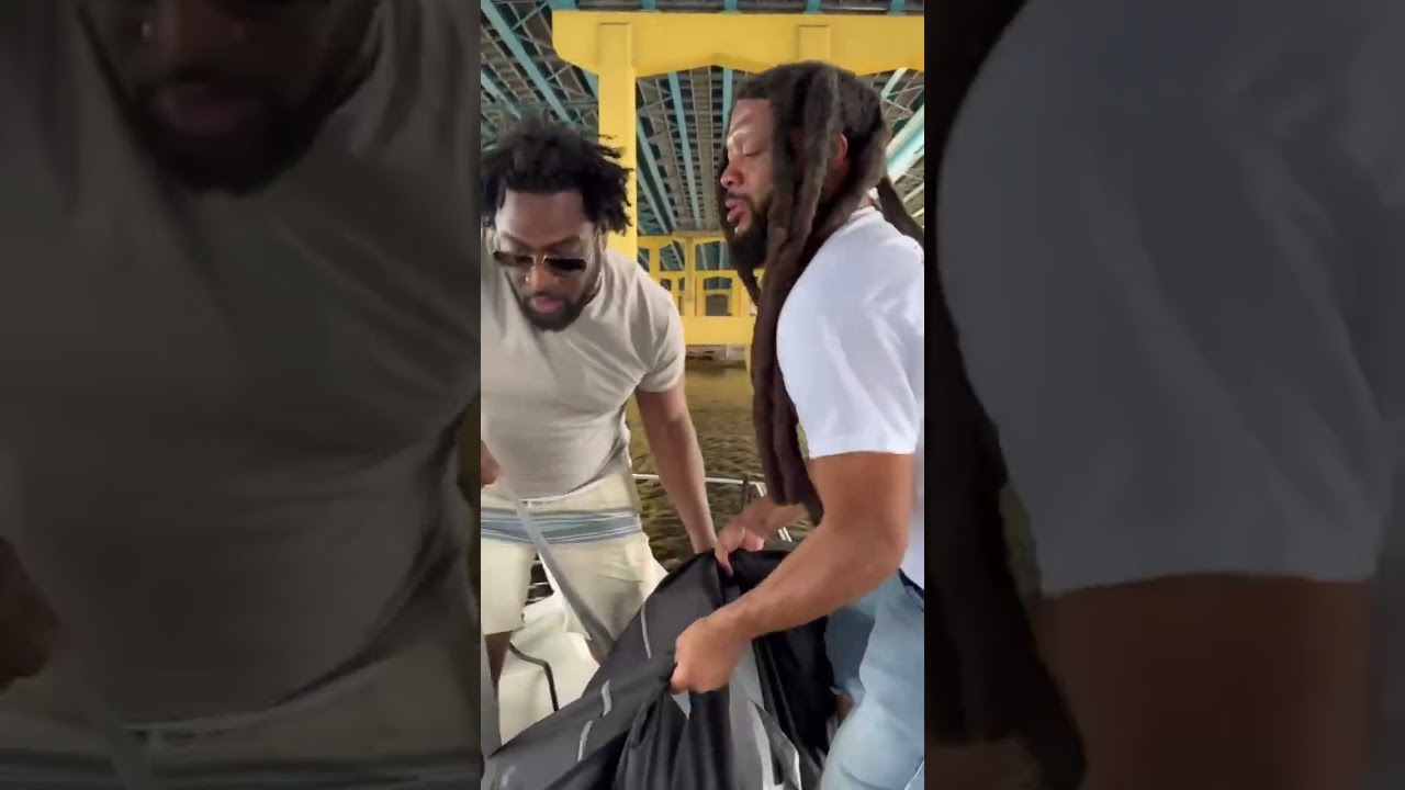 Frank and Cho struggle trying to dispose of the Hitman in the river!