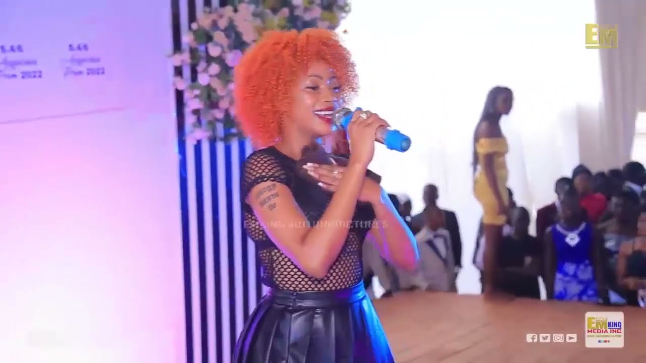 Queen Karma Sheebah live at a school prom 2022. See her latest helpers & guards around her.