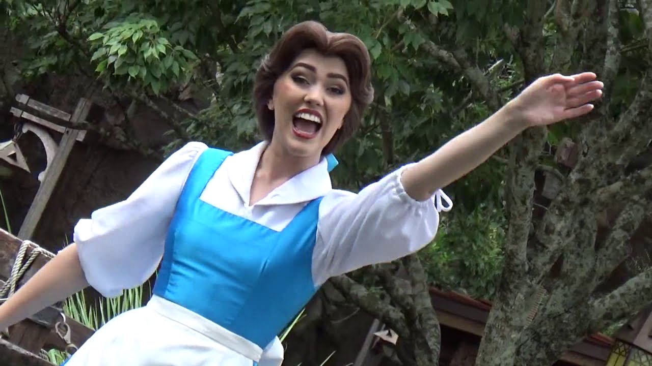 Belle Greets Guests Socially Distanced Near Enchanted Tales Cottage