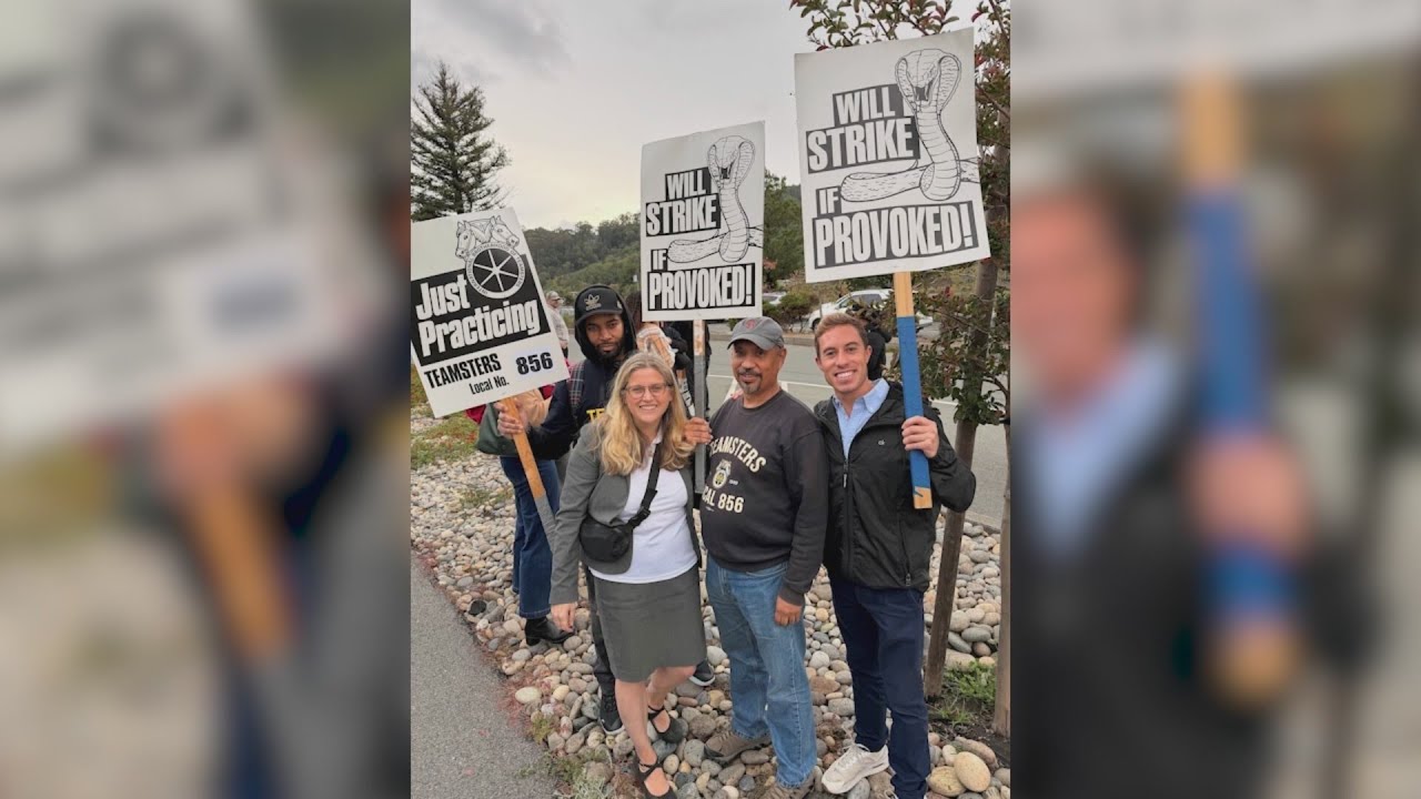 Workers at Marin County hospital hold picket line in front of entrance