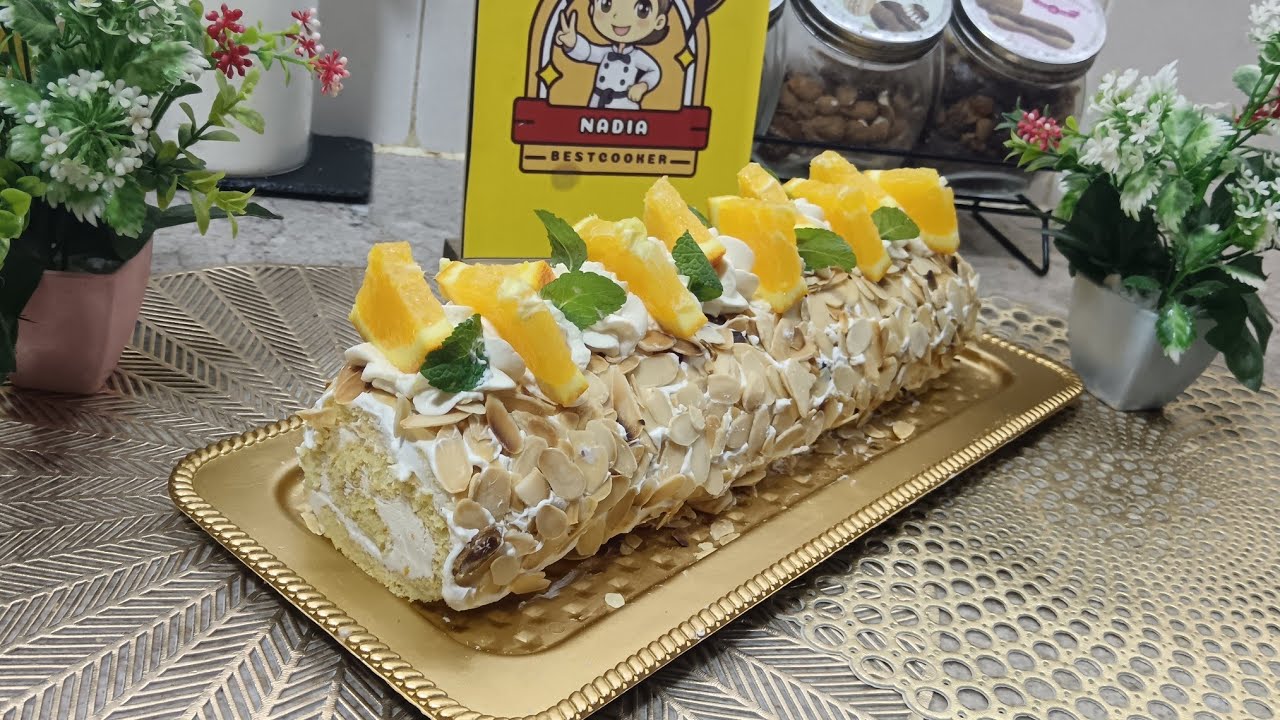 اسهل و الذ كيك رولي بذوق البرتقال  cake roulé a l'orange🍊ممكن تحضريه لوليداتك 👌👌