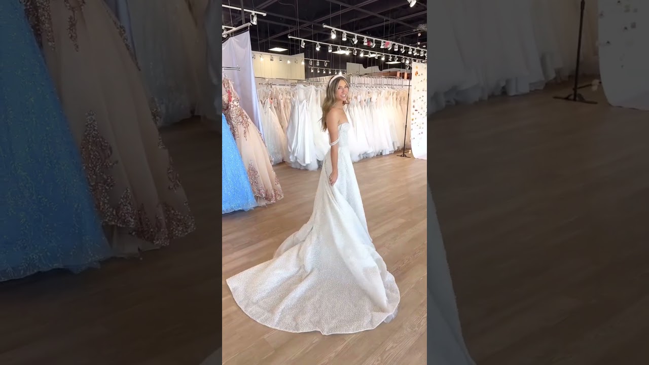 We are in LOVE with this Pearl Wedding Dress!