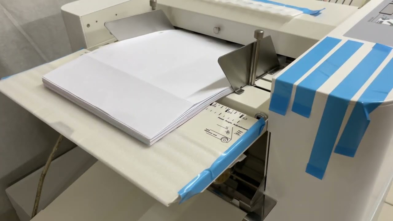 UCHIDA EZF-200摺紙機，一份三張 內三折，多張摺紙