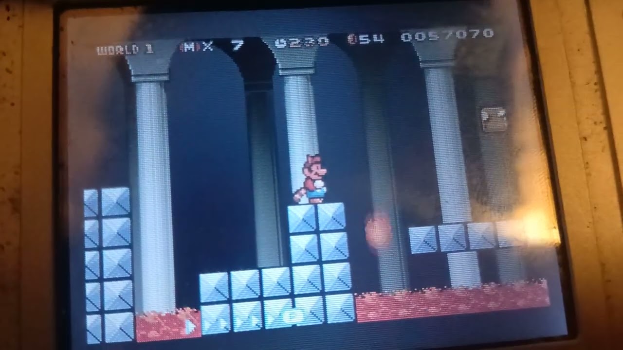 Super mario brothers  3 gba world  1 being played on my original d s