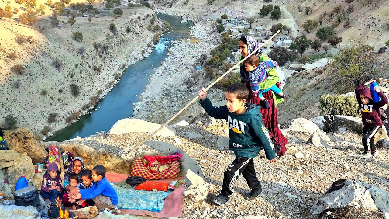 A single woman and 4 children by the wild Zagros River | Collecting oaks in the Zagros