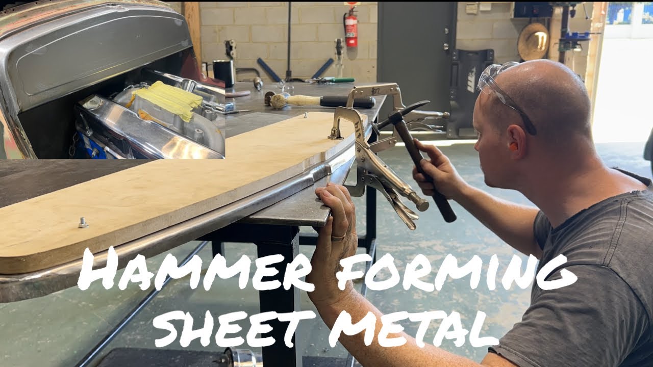 Custom hot rod fire wall made on a timber hammer form.