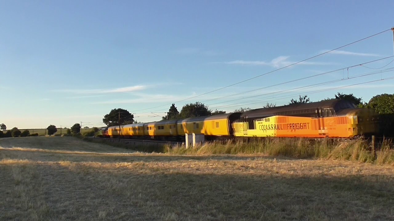 **15 tone** 37099 and 37254 storm past Stowmarket showing World Cup support on 1Q99 22/06/18