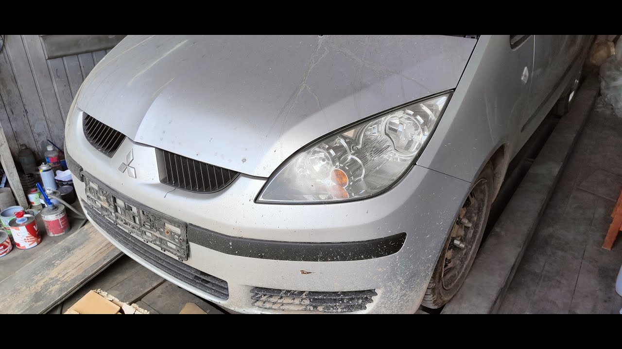 Как снять крыло  Митсубиси Кольт Mitsubishi Colt