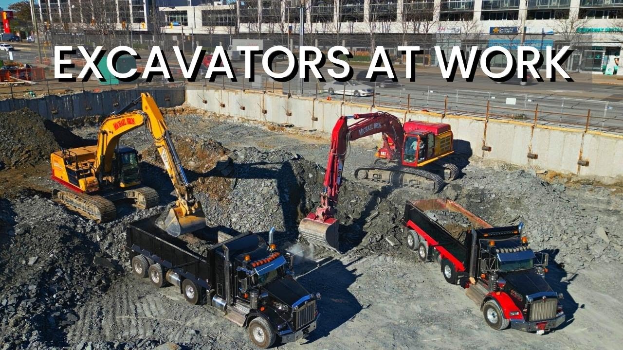 Dump Trucks and Excavators: Two CAT 349E Excavators Loading Dumpers During Excavation Process