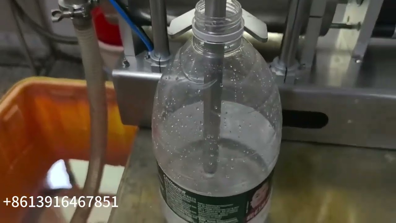Semi automatic single nozzle liquid filling machine