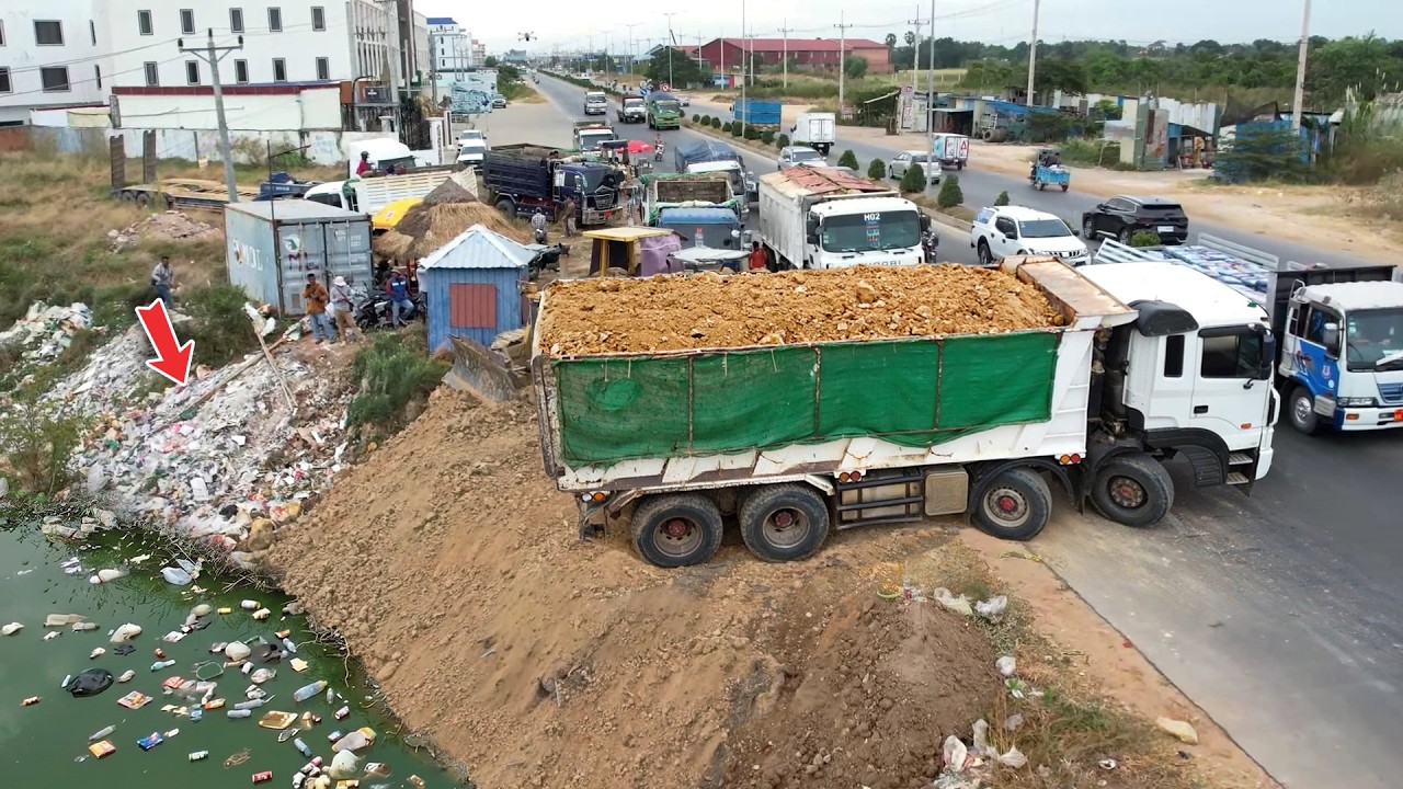 GREAT WORKING, fill Massive flooded land using Skillful DumpTruck & KomatSu Dozer Team