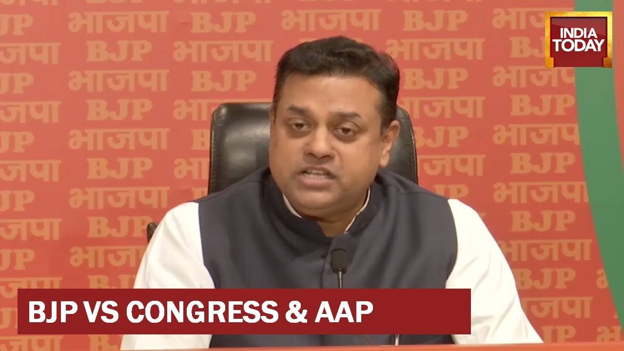 BJP Slams Congress' Bhasmasur Jibe On PM Modi; Hits Out At AAP Over Delhi Liqourgate | WATCH
