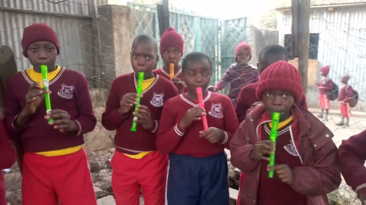 The Golden Melodies Brass Band - Mathare North in training session at Mathare North Adventist sch.