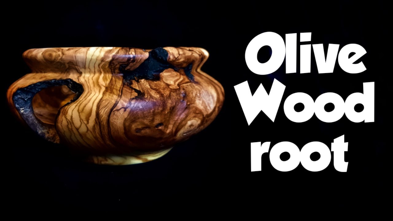Woodturning an Olive wood root hollow form