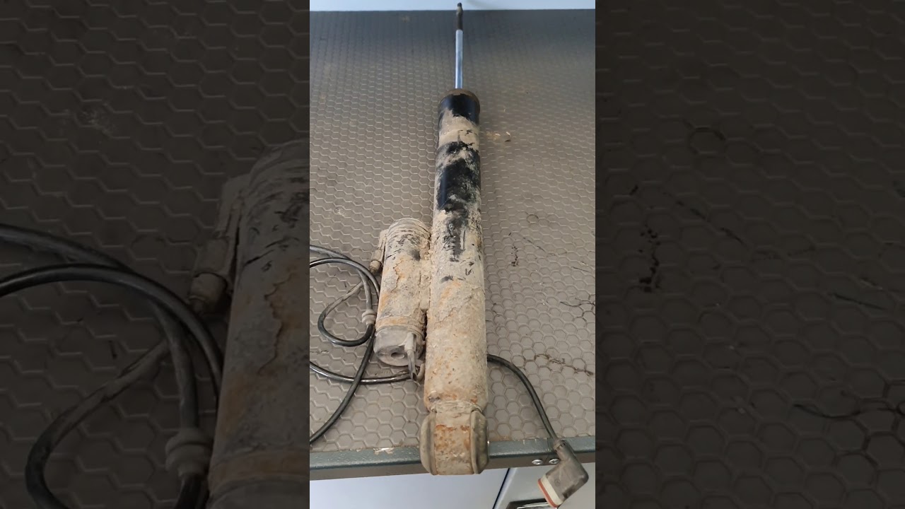 Mercedes-Benz E-Class W211 rear adaptive shock absorber repair by AirTec Bulgaria english subtitles
