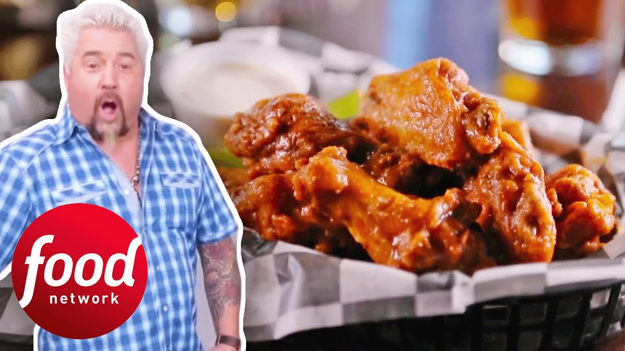 9 Minutes Of Guy Fieri Absolutely Loving Chicken Wings | Diners, Drive-Ins & Dives