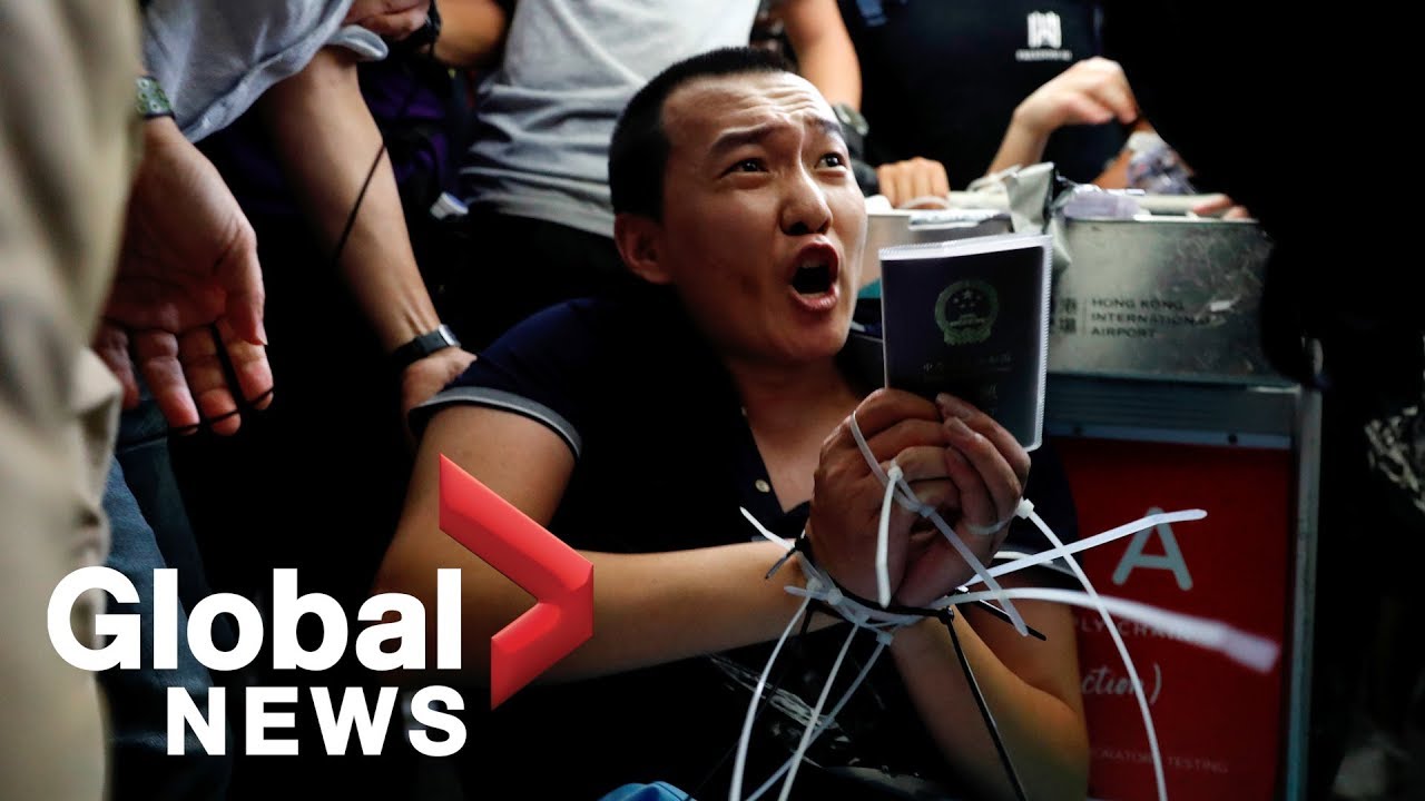 Hong Kong airport chaos: Protesters tie up, interrogate man accused of being undercover police