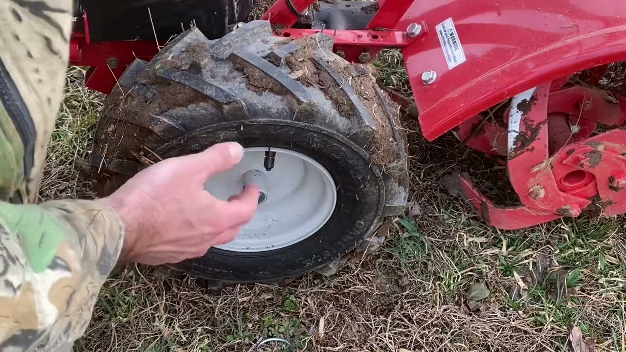 How To Unlock Troy-Bilt Rototiller Wheels To Free Roll Machine To Work Area And Then Relock For Use