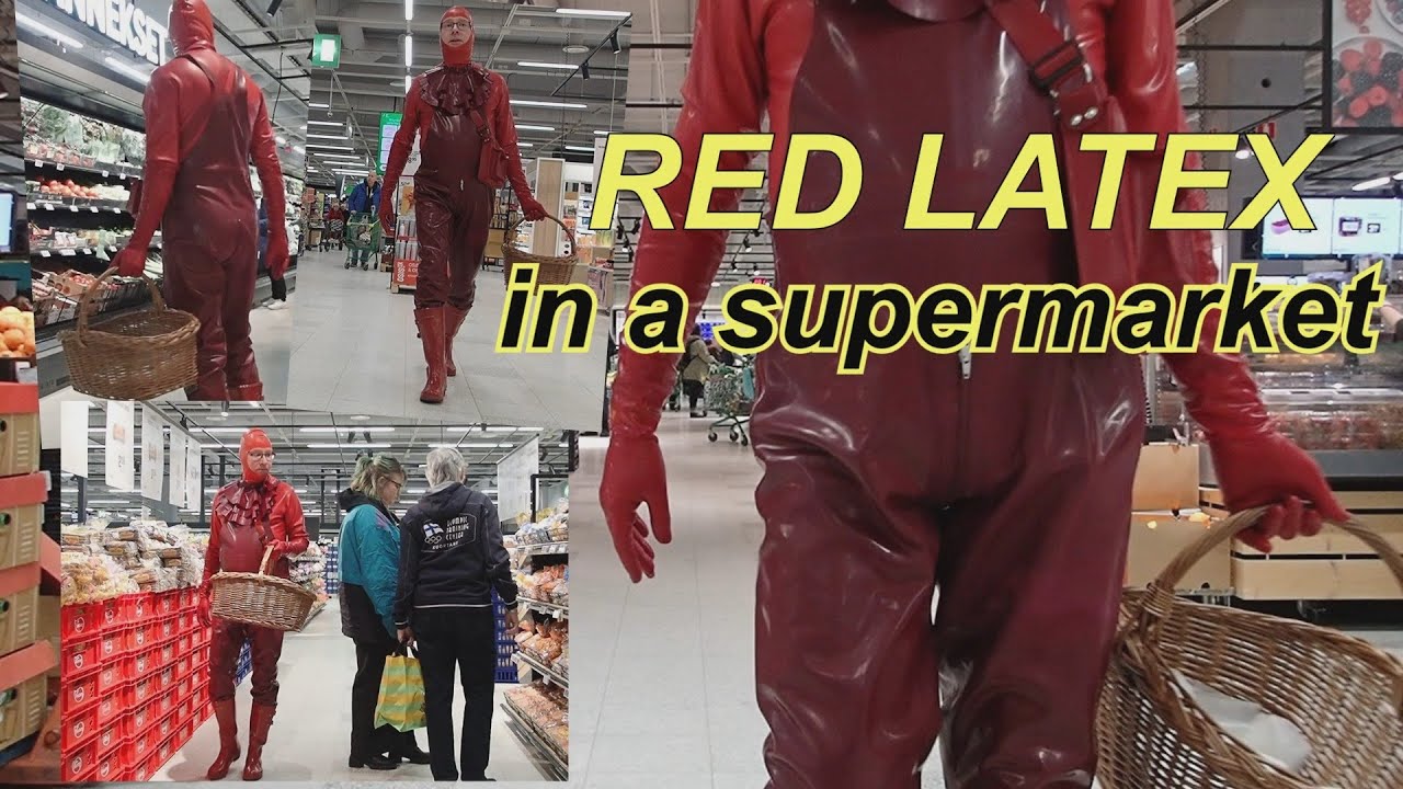 wearing red rubber outfit in a supermarket