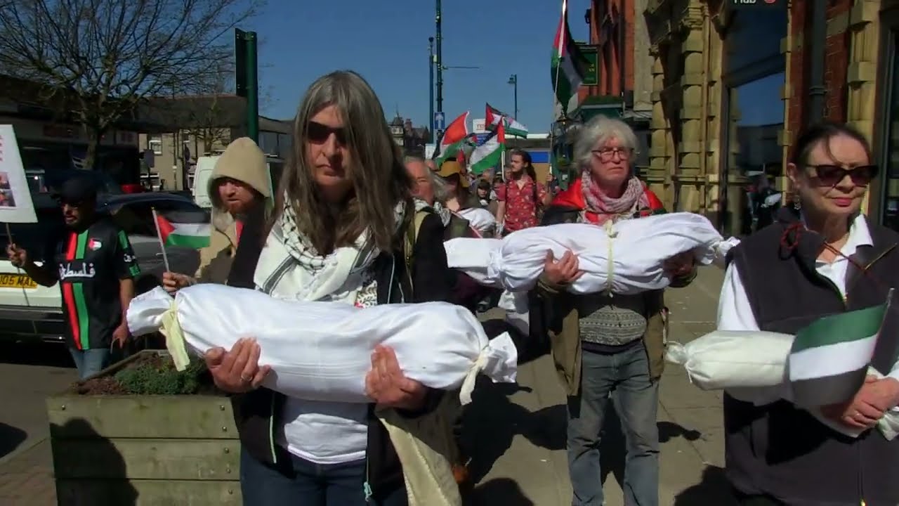 Protestors hold Silent-March and Palestine Peace-Vigil in Welsh Town.