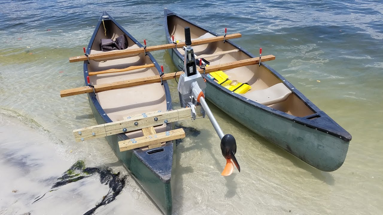 DOUBLE canoe with outboard Torqeedo 1003