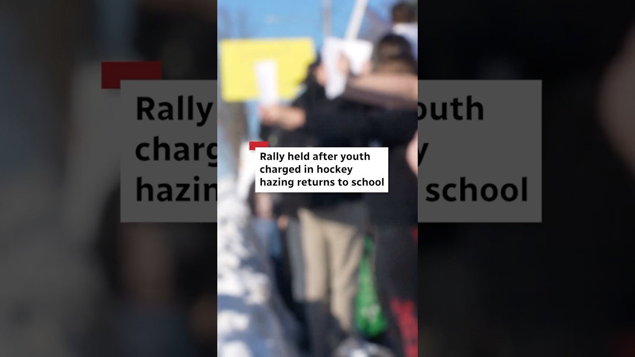 Rally held after youth charged in hockey hazing returns to school