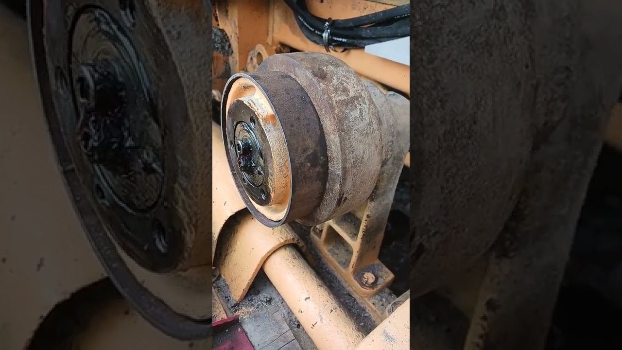 John Deere 450 dozer top roller bush fix