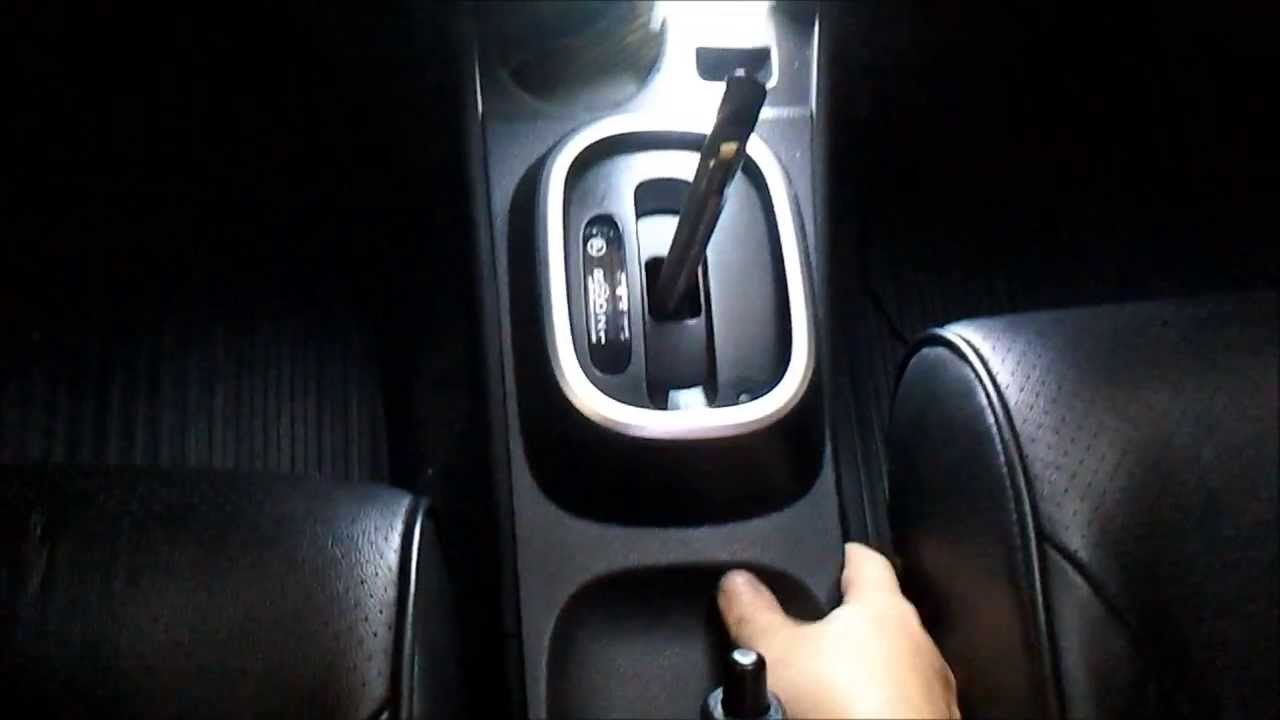 Substituição da lâmpada da seletora cambio AT NISSAN