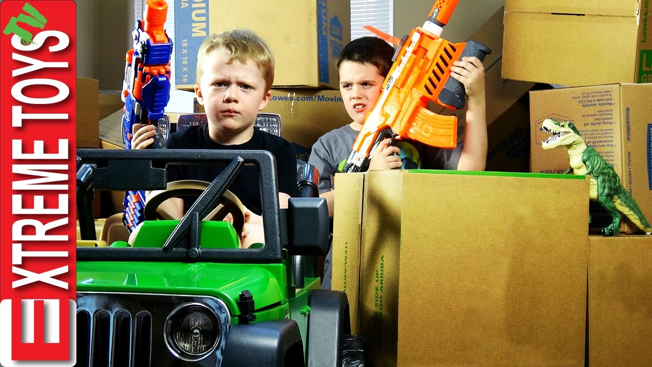 Nerf Gun Cardboard Box Battle! Cole Attacks Ethan with Nerf Guns for Stealing His Dinosaur Toy!