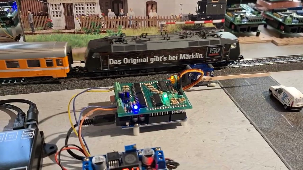 Railway crossing  voor 1 - 2 - 3  of 4   track's C of K met massadetectie en Arduino Uno