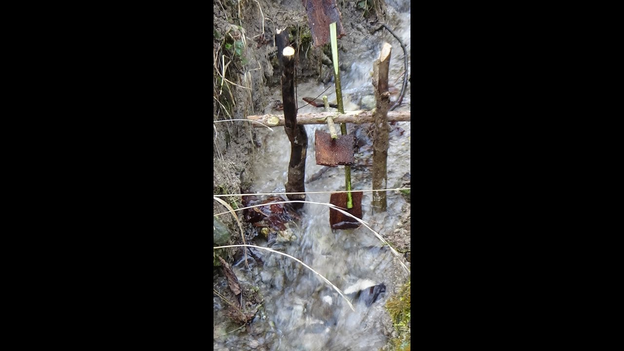 Wasserrad mit Kindern basteln aus Naturmaterialien