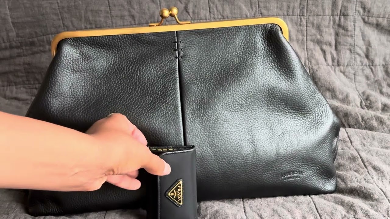 American leather co. Oversized Kiss lock clutch 