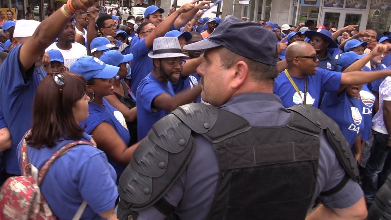WATCH: Opposition party supporters battle police