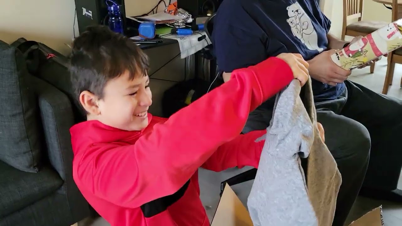 Jogie opens Christmas gifts from mom's family 2025