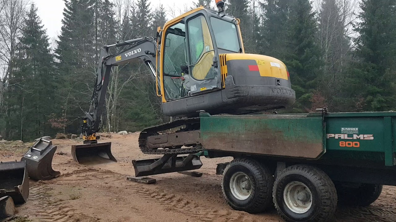Unloading an Excavator.
