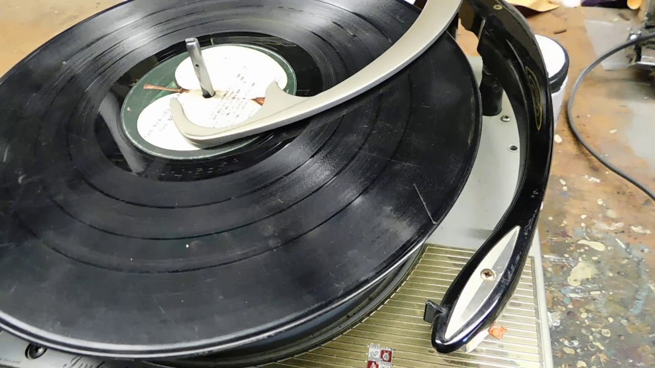 How to adjust tone arm set down position on Magnavox Imperial record changer
