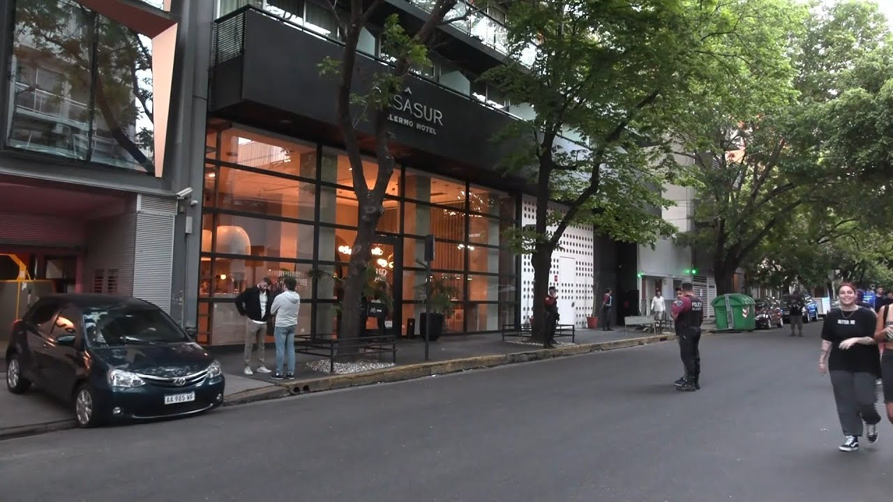 People gather outside hotel where One Direction's Liam Payne fell to death in Argentina | AFP